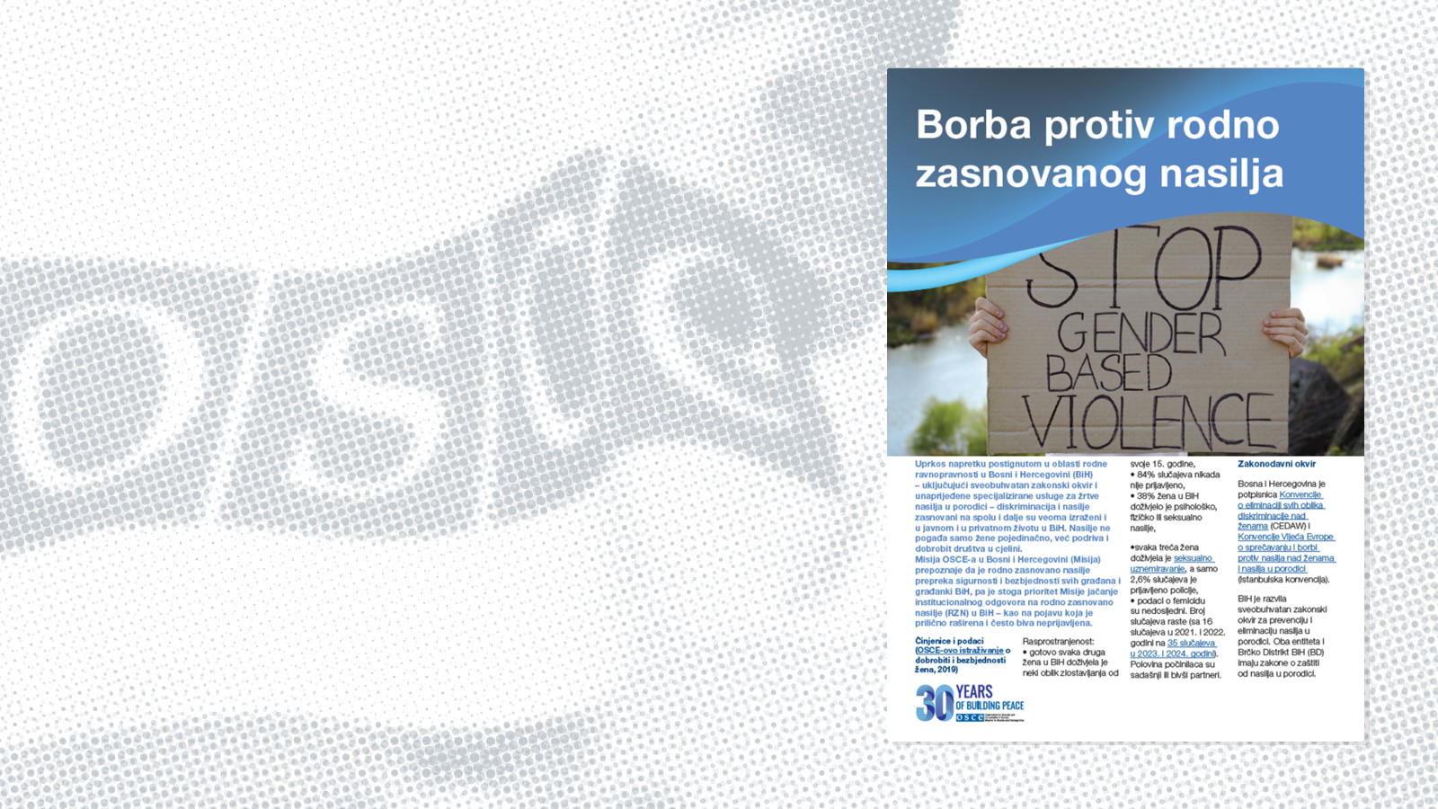 Posterska kampanja s natpisom "STOP GENDER BASED VIOLENCE" na kartonskoj tabli, tekstom i logom u donjem uglu.