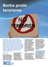 Ruke drže natpis s tekstom "No terrorism" precrtan crvenom linijom na pozadini plavog neba.